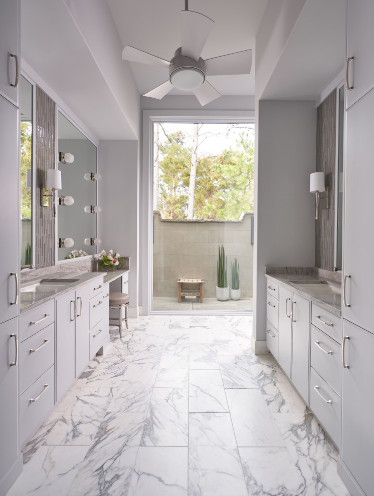 Transitional master bathroom in Houston with flat-panel cabinets, white cabinets, gray tile, grey walls, an undermount sink, white floor, grey benchtops, a double vanity and a built-in vanity.