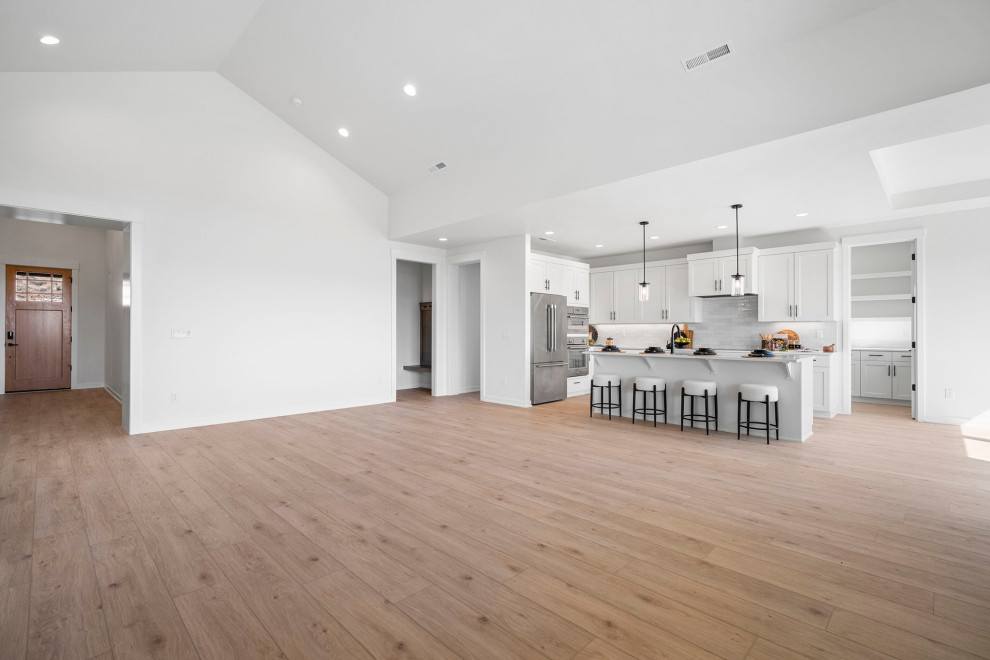 Transitional open concept living room photo