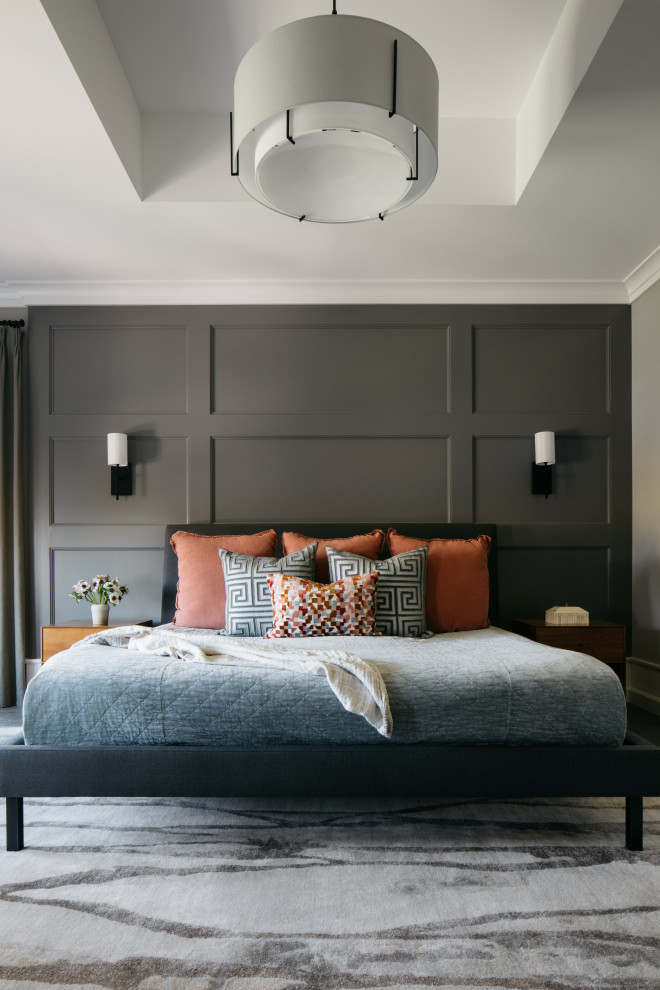 Bedroom - large farmhouse master dark wood floor, tray ceiling, wall paneling and gray floor bedroom idea in Chicago with no fireplace and gray walls