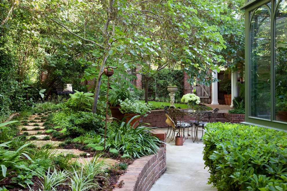 This is an example of a traditional backyard garden in Austin.