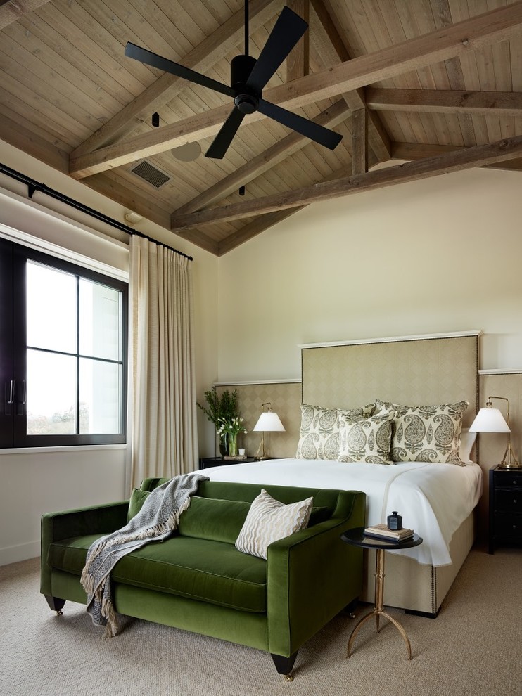 This is an example of a transitional bedroom in San Francisco with white walls, carpet and no fireplace.