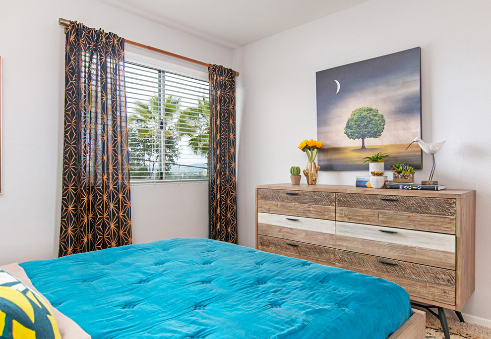 This is an example of a midcentury bedroom in Orange County.
