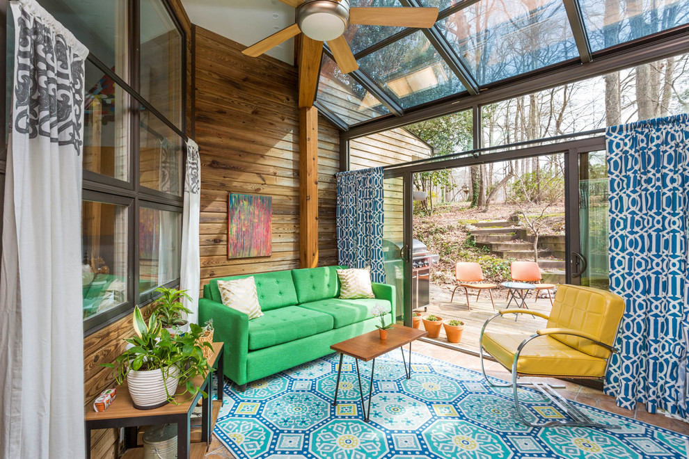 Example of a 1950s sunroom design in Raleigh