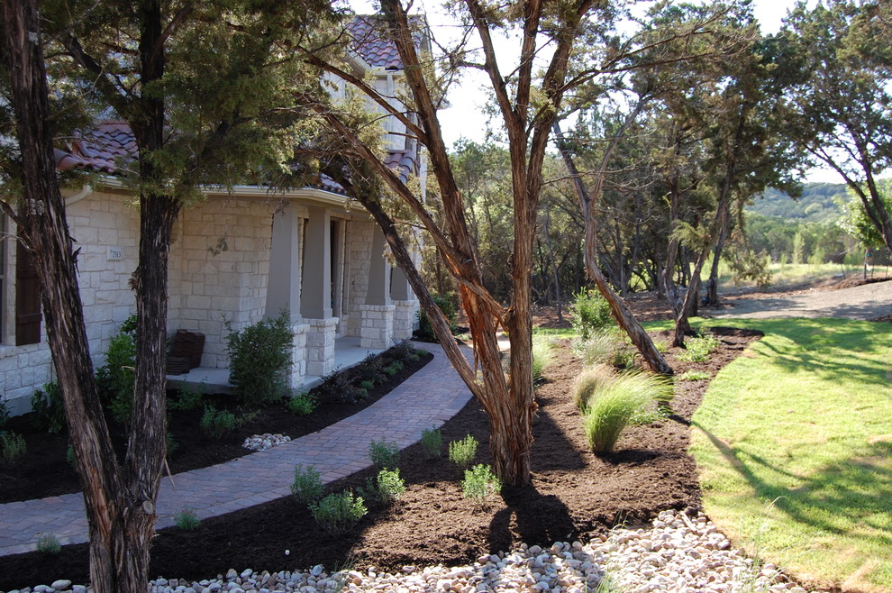 Inspiration for a rustic home design remodel in Austin