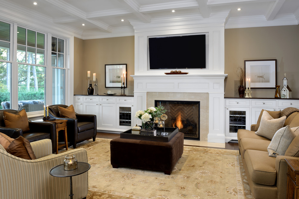 This is an example of an arts and crafts open concept family room in Toronto with a wall-mounted tv.