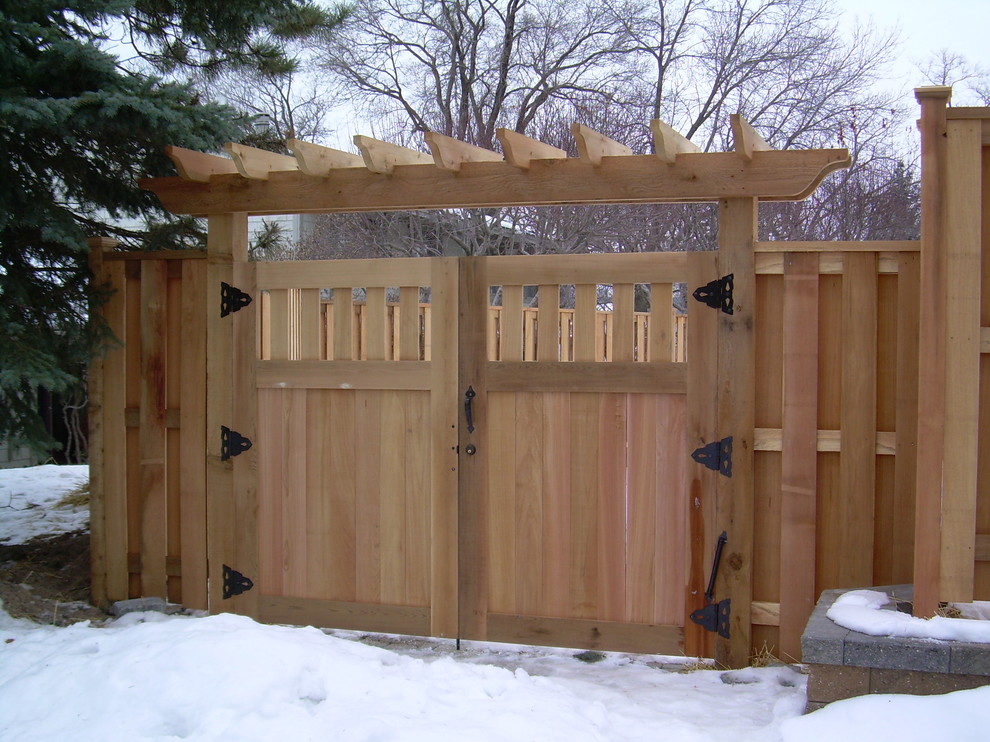 Photo of a mid-sized craftsman backyard landscaping in Minneapolis.