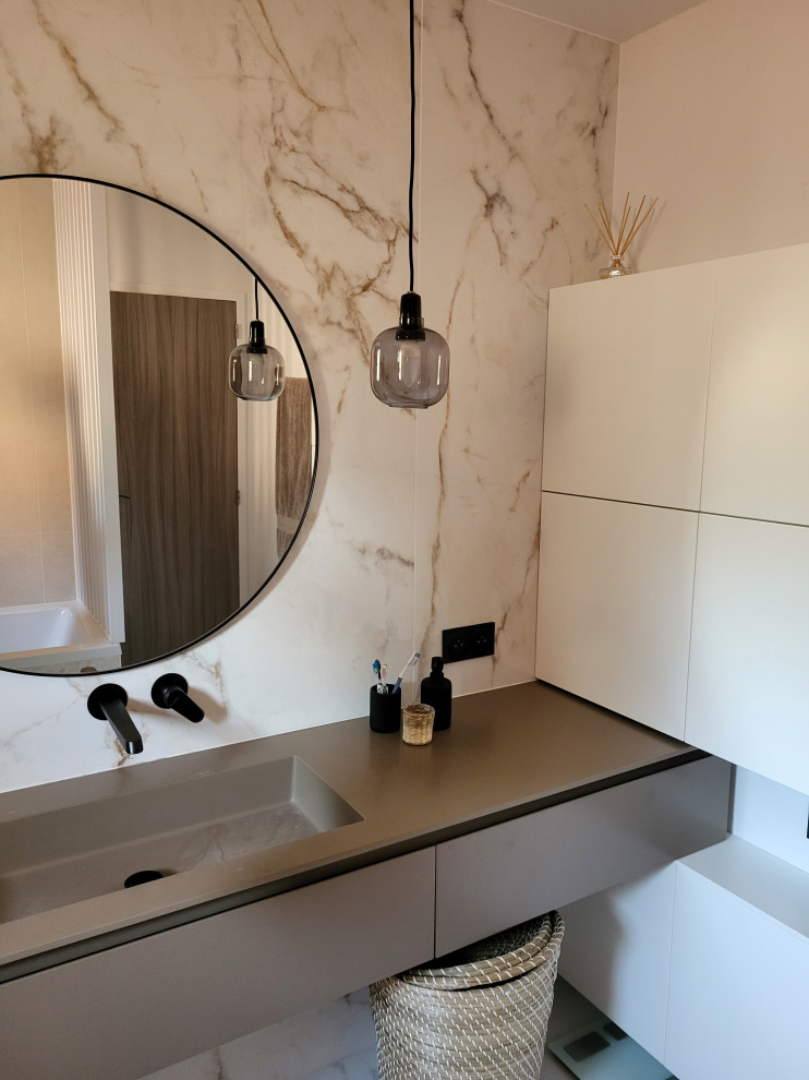 Inspiration for a contemporary ensuite bathroom in Other with flat-panel cabinets, white cabinets, a claw-foot bath, a walk-in shower, a two-piece toilet, marble tiles, marble flooring, a trough sink, solid surface worktops, white floors, brown worktops, a single sink and a floating vanity unit.
