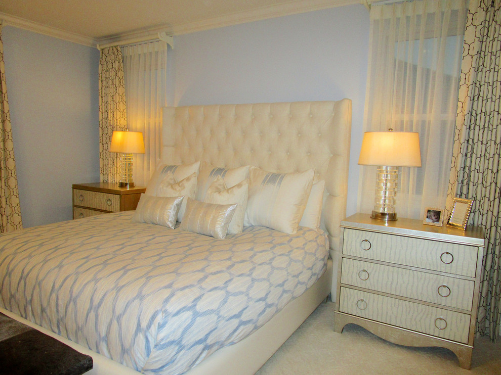 Inspiration for a large transitional master bedroom in San Diego with blue walls, carpet, no fireplace and white floor.
