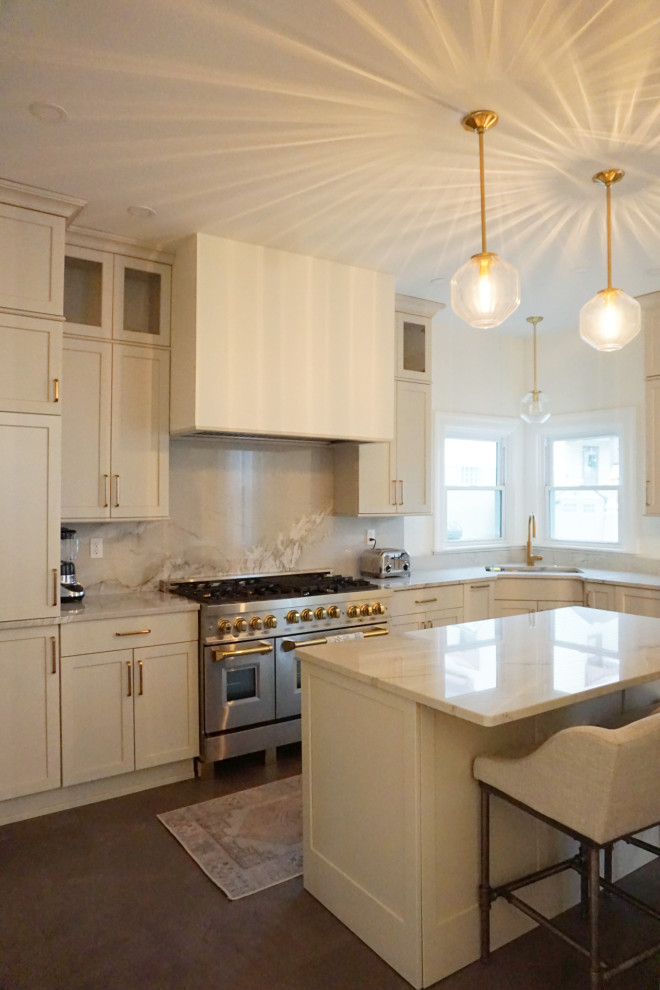 Kitchen - transitional vinyl floor and gray floor kitchen idea with an undermount sink, shaker cabinets, gray cabinets, quartzite countertops, stone slab backsplash, stainless steel appliances and an island