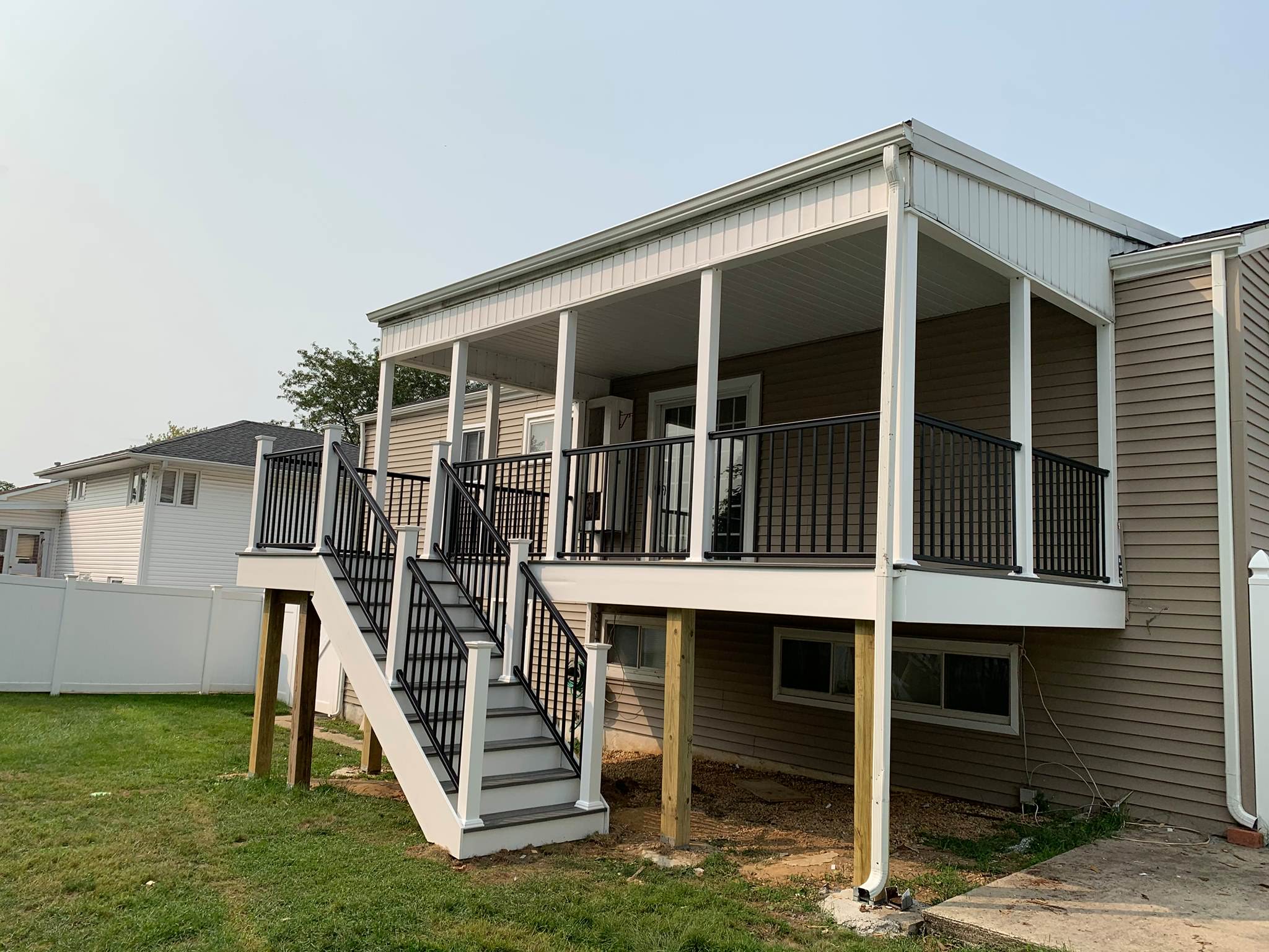 Resurfaced old deck with Trex transcends Island Mist Color