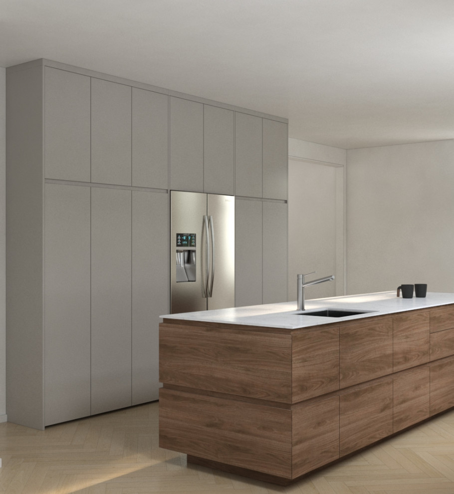 Example of a mid-sized danish galley light wood floor enclosed kitchen design with an undermount sink, flat-panel cabinets, medium tone wood cabinets, marble countertops, stainless steel appliances, an island and white countertops