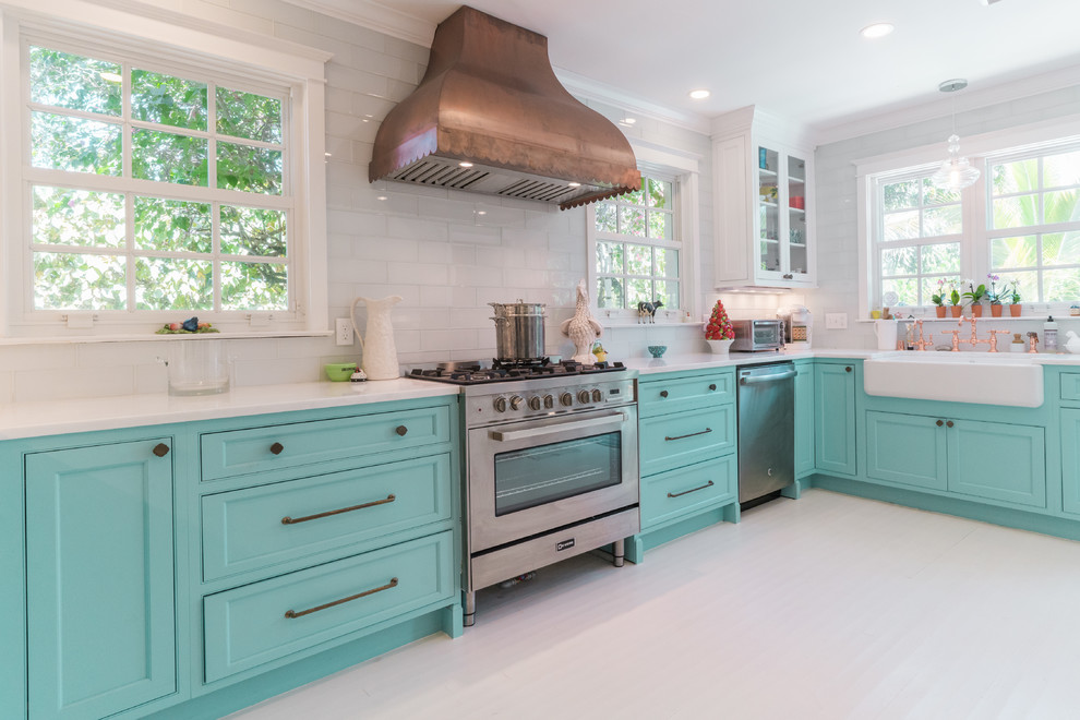 Design ideas for a tropical kitchen in Other with beaded inset cabinets, turquoise cabinets, marble benchtops, painted wood floors and white floor.