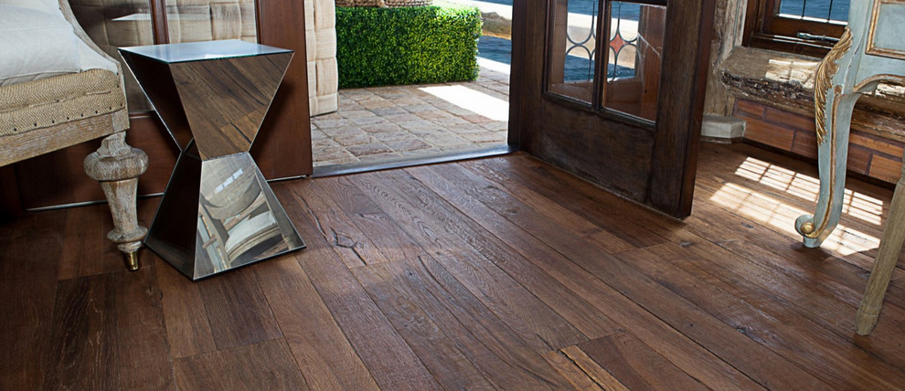 Mid-sized transitional dark wood floor foyer photo in Houston with a dark wood front door