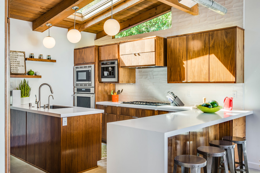 Mid-sized midcentury kitchen in Los Angeles.