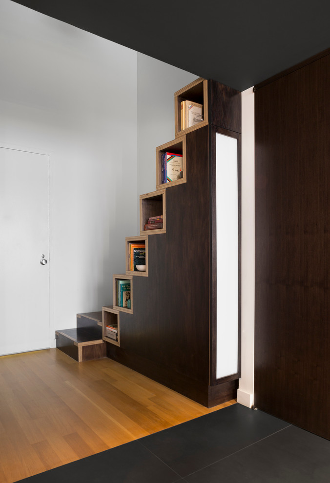 Example of a small trendy wooden staircase design in New York with wooden risers