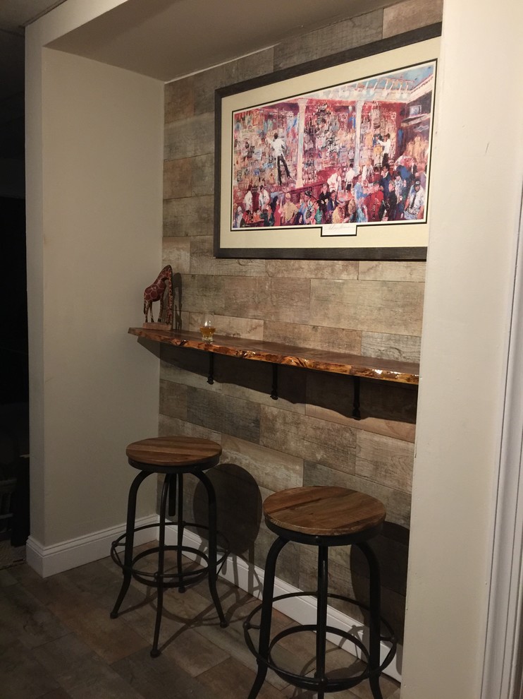 This is an example of a transitional home bar in Philadelphia.