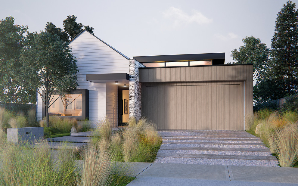 Small modern one-storey white house exterior in Geelong with wood siding, a hip roof and a metal roof.