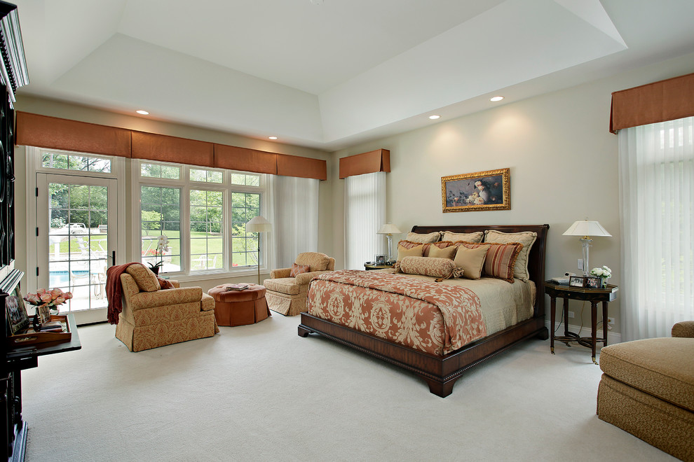 Traditional bedroom in Denver with carpet.