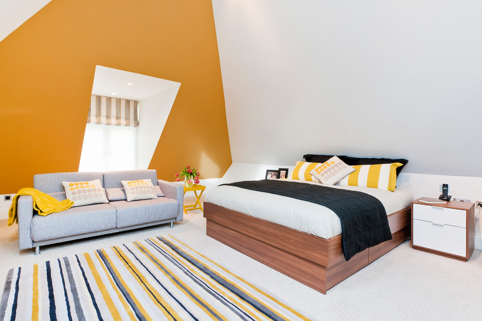 This is an example of a contemporary bedroom in London with white walls and carpet.
