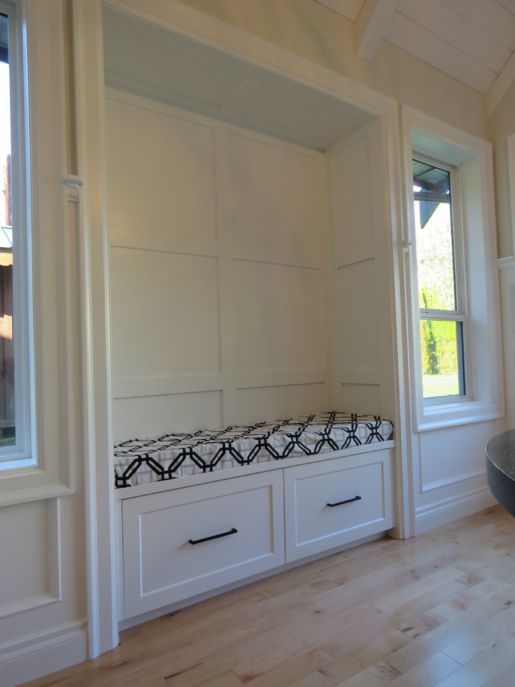 Example of a transitional home design design in Vancouver