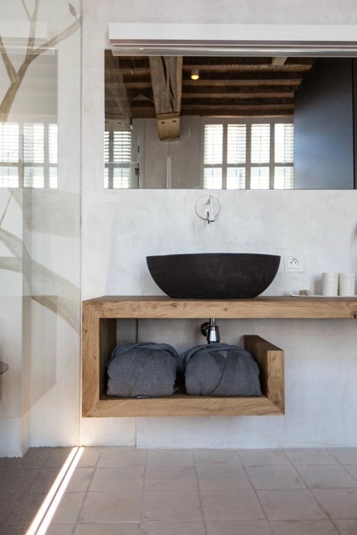 Freestanding bathtub - small eclectic master gray tile and ceramic tile freestanding bathtub idea in Chicago with a vessel sink, open cabinets, light wood cabinets and wood countertops