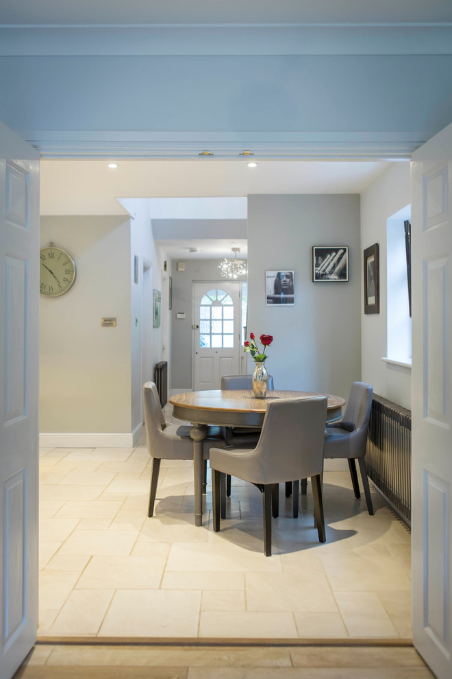 Example of a minimalist dining room design in Buckinghamshire