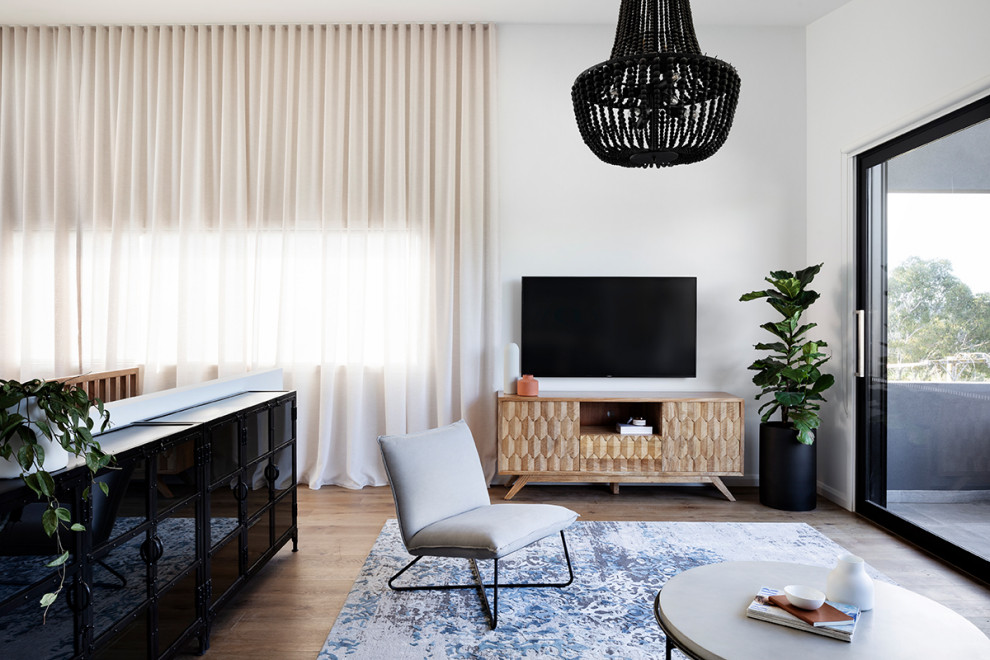 Design ideas for a scandinavian living room in Melbourne.