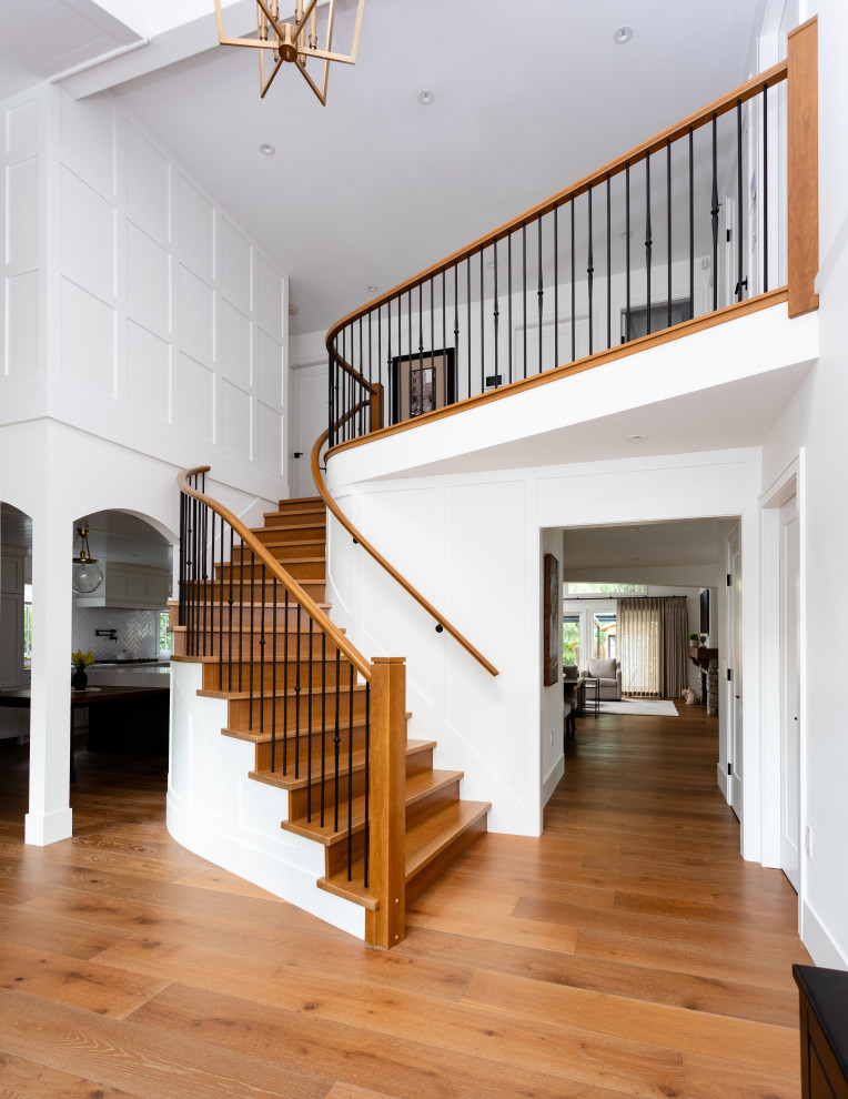 Example of a transitional home design design in Vancouver