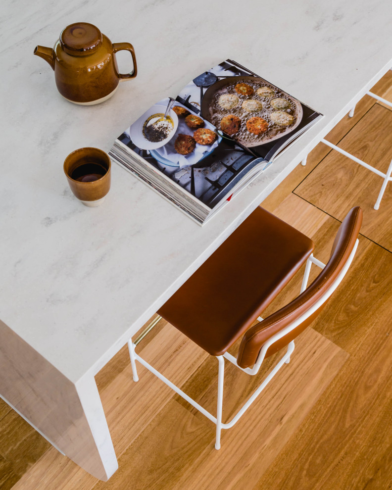 Photo of a large contemporary galley eat-in kitchen in Melbourne with with island.