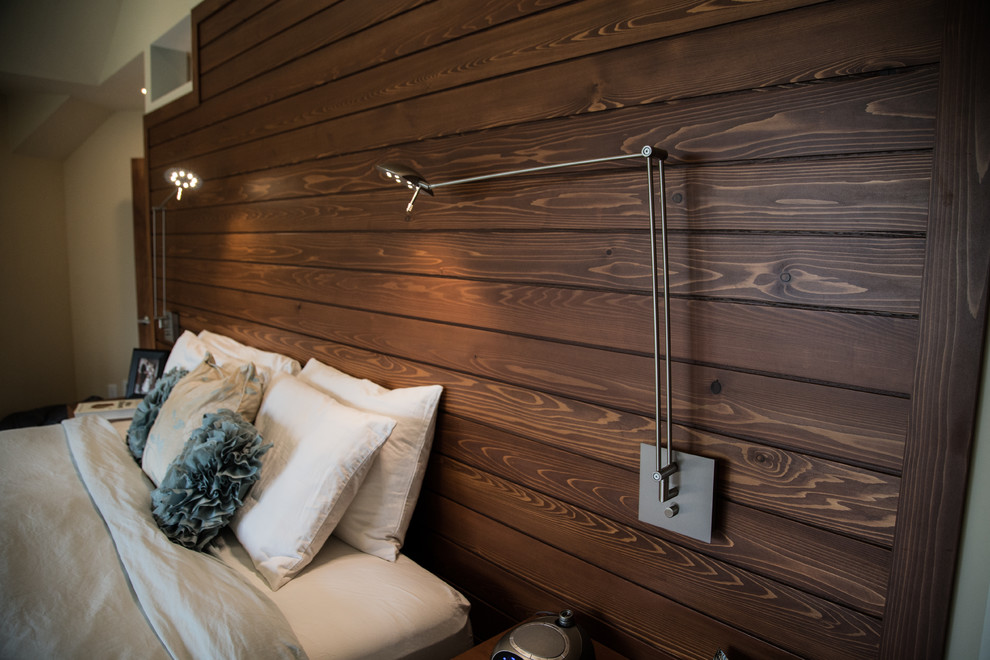 Bedroom - transitional master light wood floor and brown floor bedroom idea in Minneapolis with beige walls
