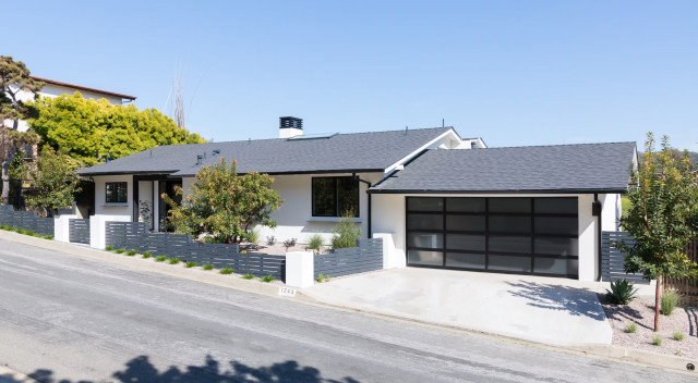 Full exterior view with timeless lines modern-garden