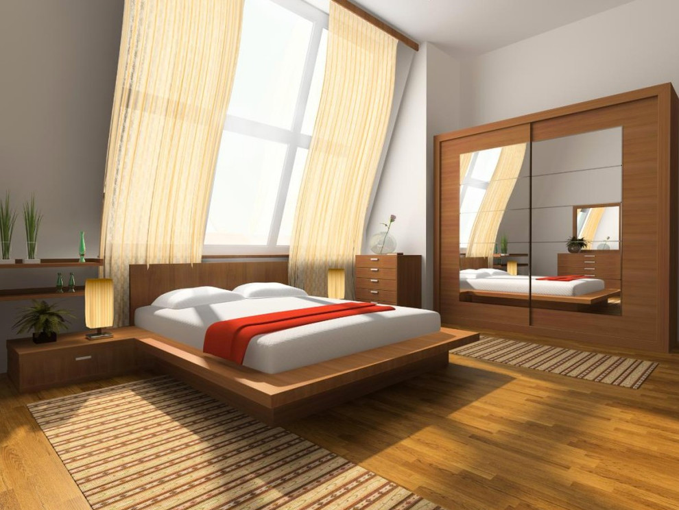 Inspiration for a transitional medium tone wood floor bedroom remodel with white walls
