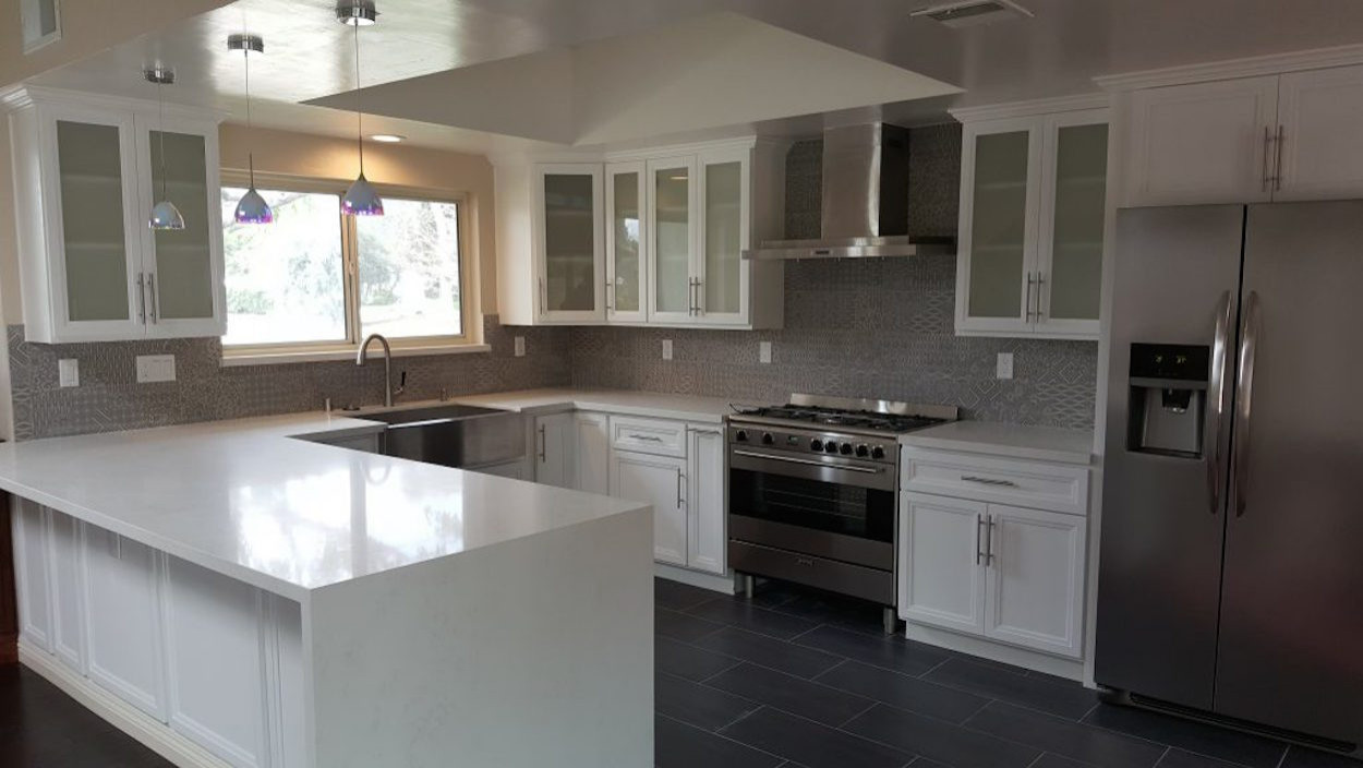 Sleek Contemporary Kitchen with Unique Backsplash