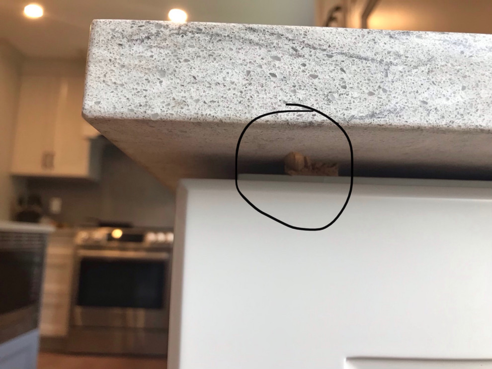 Wood shims under quartz countertops