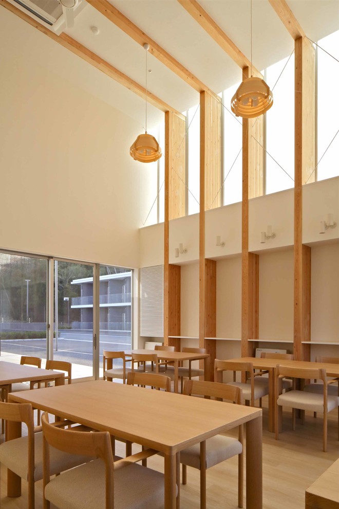Design ideas for a contemporary dining room in Yokohama.