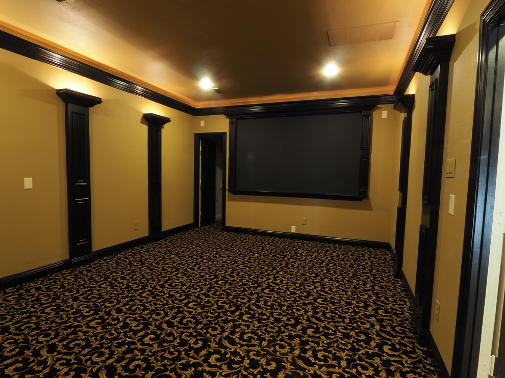 Photo of a large mediterranean enclosed home theatre in Dallas with yellow walls, carpet and a wall-mounted tv.
