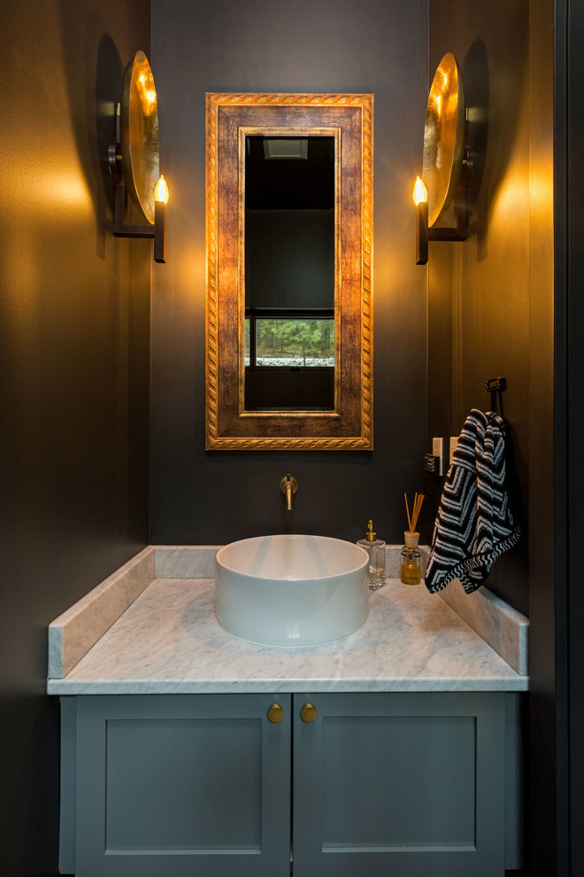 Small modern powder room in Seattle with recessed-panel cabinets, grey cabinets, black walls, a vessel sink and quartzite benchtops.
