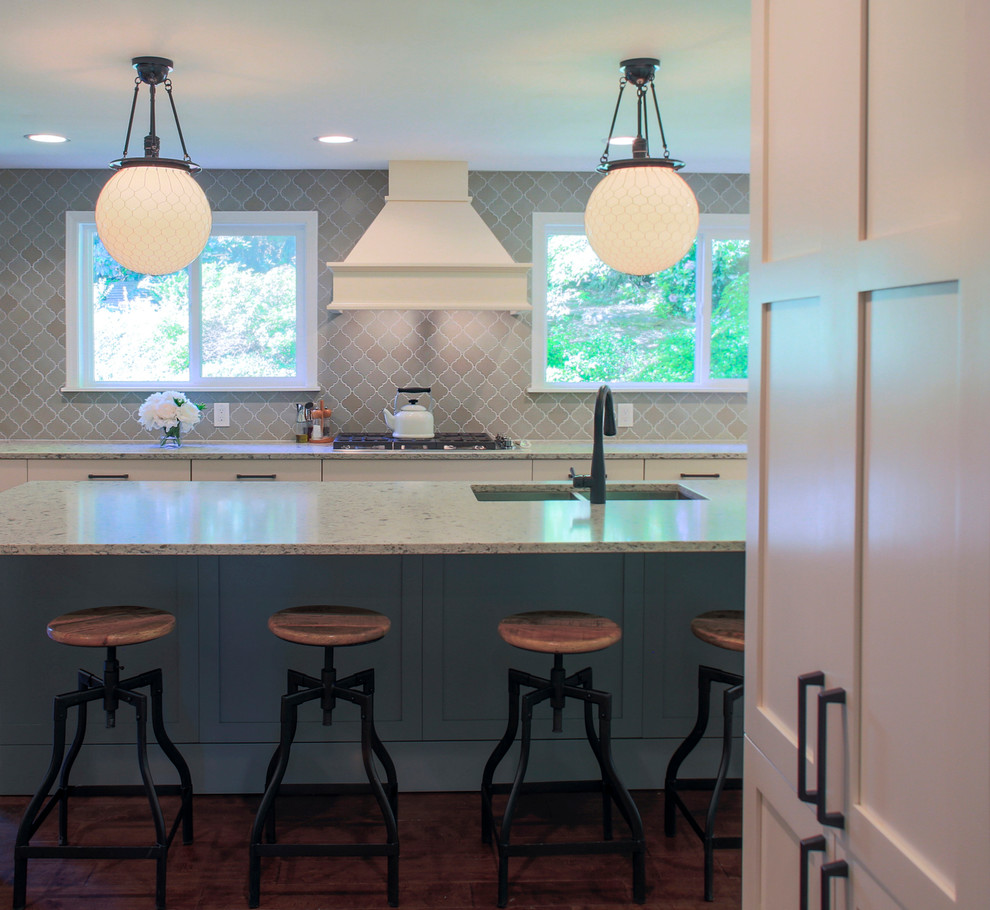Large country u-shaped dark wood floor open concept kitchen photo in Seattle with an undermount sink, shaker cabinets, gray cabinets, quartzite countertops, gray backsplash, mosaic tile backsplash, stainless steel appliances and an island