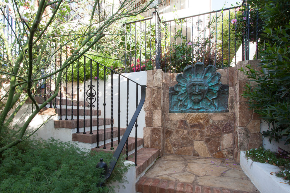 Inspiration for a mid-sized mediterranean l-shaped staircase in San Diego.