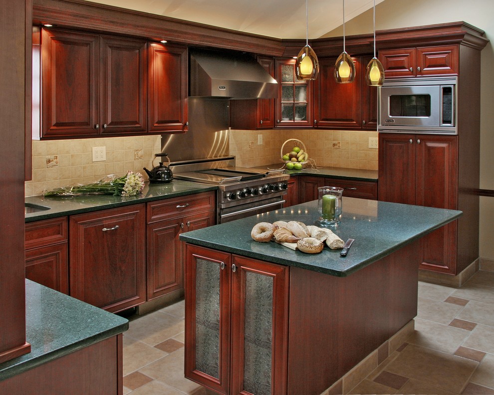 Eat-in kitchen - large transitional u-shaped ceramic tile and beige floor eat-in kitchen idea with a drop-in sink, raised-panel cabinets, quartz countertops, beige backsplash, mosaic tile backsplash, stainless steel appliances, dark wood cabinets and an island