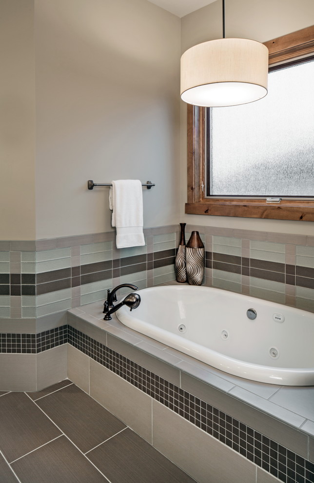 Photo of a traditional bathroom in Omaha with a drop-in tub.