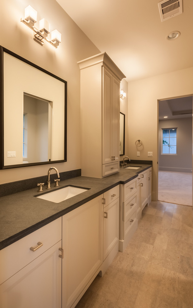 Mid-sized transitional master bathroom photo in Houston with recessed-panel cabinets and beige walls