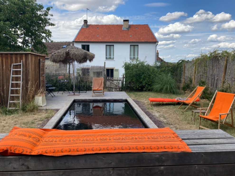 le jardin, la piscine et la maison après travaux