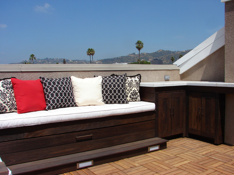 This is an example of a small contemporary rooftop deck in Los Angeles with no cover.
