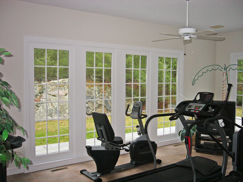 Design ideas for a mid-sized traditional multipurpose gym in Boston with beige walls, ceramic floors and beige floor.
