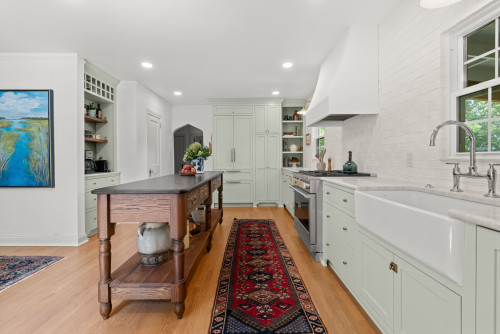 Modern Canadian kitchen with RTA cabinets, farmhouse sink, and shaker-style doors