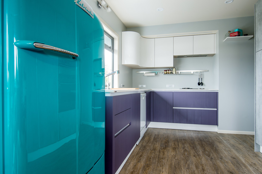 Mid-sized midcentury u-shaped kitchen pantry in Hamilton with a double-bowl sink, flat-panel cabinets, purple cabinets, laminate benchtops, vinyl floors and no island.