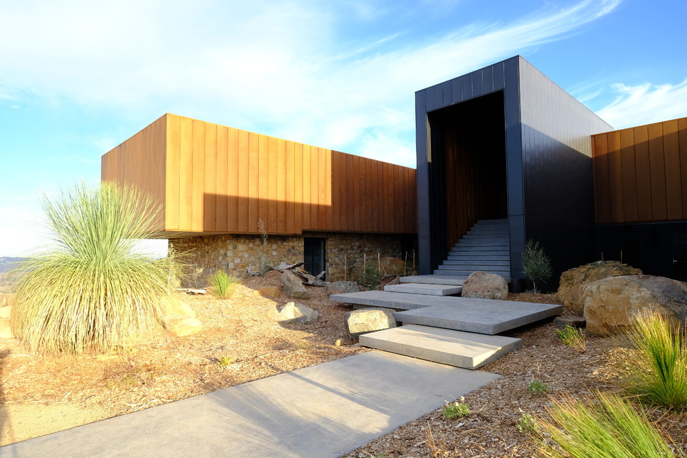 Inspiration for an expansive contemporary home design in Melbourne.