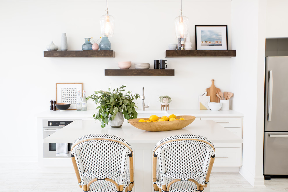 Example of a transitional kitchen design in Cleveland