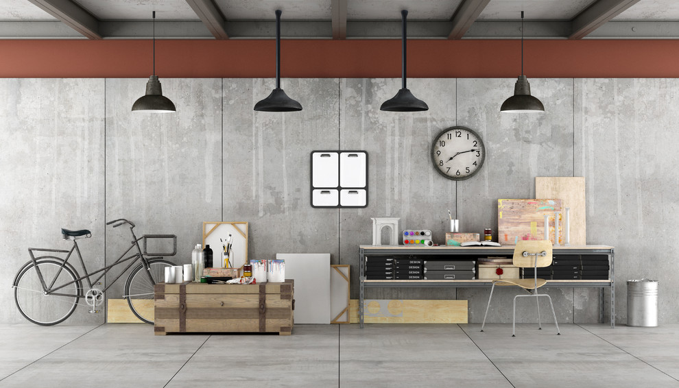 Inspiration for a large industrial study room in Melbourne with grey walls, concrete floors, a freestanding desk and grey floor.